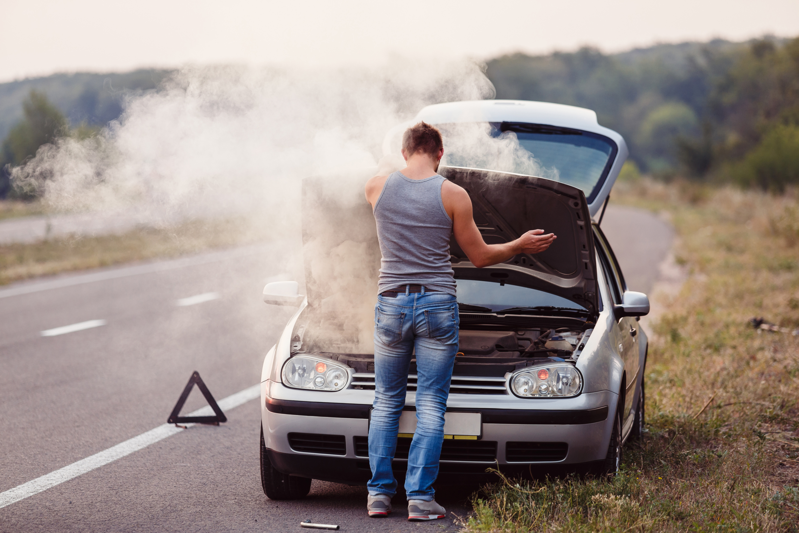 Car breaks down. Smoke from the Hood of the car.